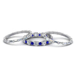 Load image into Gallery viewer, diamond-eternity-stacking-band-with-baguette-and-sapphire-in-white-gold-FD9119GSABLANGLE3-NL-WG.jpg
