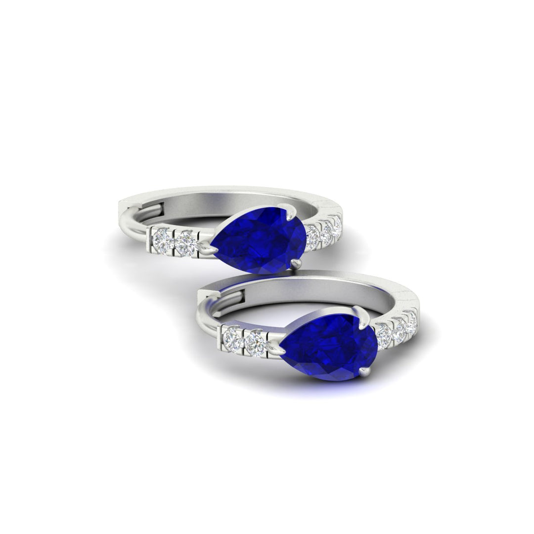 diamond-huggies-with-large-pear-sapphire-center-in-white-gold-fdear11703gsablangle4-nl-wg.jpg