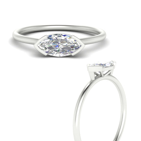 east-west-marquise-cut-solitaire-ring-in-platinum-fdenr11664mqangle3-nl-wg.jpg?v=1768897912