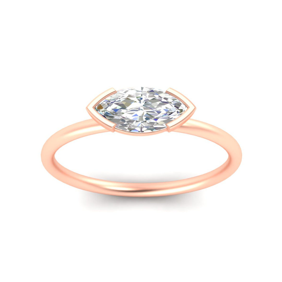 east-west-marquise-cut-solitaire-ring-in-rose-gold-fdenr11664mqangle5-nl-rg.jpg?v=1768897912