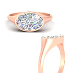 Load image into Gallery viewer, east-west-oval-bezel-engagement-ring-in-rose-gold-fdenr11606ovrangle3-nl-rg
