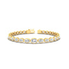Load image into Gallery viewer, east-west-oval-bezel-tennis-bracelet-in-yellow-gold-fdbrc11733sleep-nl-yg.jpg?v=1776314672