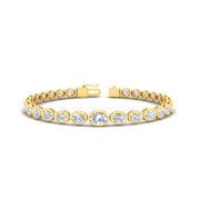 east-west-oval-bezel-tennis-bracelet-in-yellow-gold-fdbrc11733sleep-nl-yg.jpg?v=1776314672