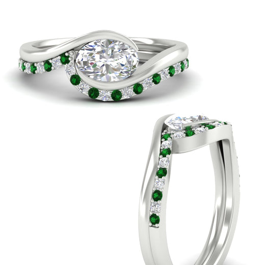 east-west-oval-emerald-wedding-band-ring-set-in-white-gold-fdens7806ovgemgrangle3-nl-wg_7d490460-b45e-44e2-90f3-a0c98eed4387.jpg?v=1759992100