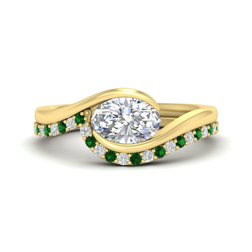 east-west-oval-emerald-wedding-band-ring-set-in-yellow-gold-fdens7806ovgemgr-nl-yg_8f7b19fe-759c-42e1-995f-6f8c9324695e.jpg?v=1759992100