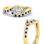 Load image into Gallery viewer, east-west-oval-sapphire-wedding-band-ring-set-in-yellow-gold-fdens7806ovgsablangle3-nl-yg_370f6ac3-25f7-45c7-bf98-33afb684ecdf.jpg?v=1759992100
