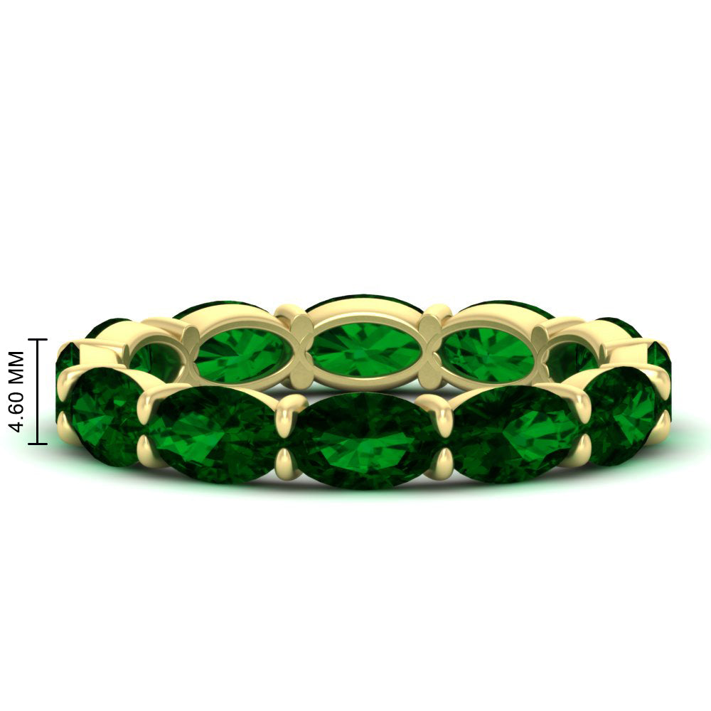 east-west-oval-shape-6-carat-eternity-emerald-wedding-band-in-yellow-gold-FDEWB8425OVGEMGR-6.00CT-NL-YG-HW