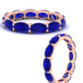 Thumbnail 8 - east-west-oval-shape-6-carat-eternity-sapphire-wedding-band-in-rose-gold-FDEWB8425OVGSABLANGLE3-6.00CT-NL-RG