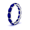 Thumbnail 47 - east-west-oval-shape-6-carat-eternity-sapphire-wedding-band-in-white-gold-FDEWB8425OVGSABLANGLE2-6.00CT-NL-WG