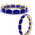 Thumbnail 80 - east-west-oval-shape-6-carat-eternity-sapphire-wedding-band-in-yellow-gold-FDEWB8425OVGSABLANGLE3-6.00CT-NL-YG