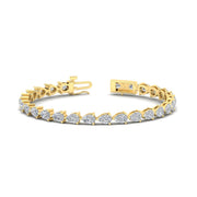 east-west-pear-diamond-tennis-bracelet-in-yellow-gold-FDBRC11577-nl-yg.jpg?v=1776416331