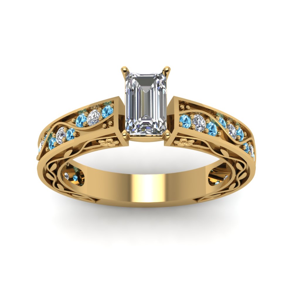 emerald-cut-antique-filigree-diamond-ring-with-ice-blue-topaz-in-14K-yellow-gold-FDENS3543EMRGICBLTOANGLE5-NL-YG_b36b5ada-073d-46c4-b041-75b3b5424704