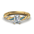 Thumbnail 76 - emerald-cut-blue-topaz-twisted-vine-engagement-ring-in-yellow-gold-FD9127EMRGICBLTO-NL-YG