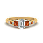 Load image into Gallery viewer, emerald-cut-channel-three-stone-diamond-engagement-ring-with-orange-sapphire-in-yellow-gold-FDENS205EMRGSAOR-NL-YG.jpg
