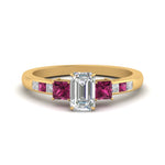 Load image into Gallery viewer, emerald-cut-channel-three-stone-diamond-engagement-ring-with-pink-sapphire-in-yellow-gold-FDENS205EMRGSADRPI-NL-YG.jpg
