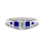 Load image into Gallery viewer, emerald-cut-channel-three-stone-diamond-engagement-ring-with-sapphire-in-white-gold-FDENS205EMRGSABL-NL-WG.jpg

