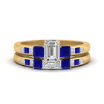 Load image into Gallery viewer, emerald-cut-channel-three-stone-diamond-engagement-ring-with-sapphire-in-yellow-gold-FDENS205EMGSABL-NL-YG.jpg
