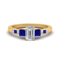Thumbnail 13 - emerald-cut-channel-three-stone-diamond-engagement-ring-with-sapphire-in-yellow-gold-FDENS205EMRGSABL-NL-YG.jpg