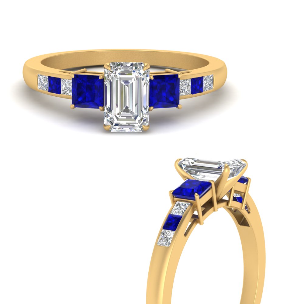 emerald-cut-channel-three-stone-diamond-engagement-ring-with-sapphire-in-yellow-gold-FDENS205EMRGSABL-NL-YG.jpg
