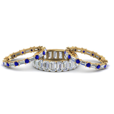 emerald-cut-eternity-band-with-matching-baguette-and-round-with-blue-sapphire-in-14K-yellow-gold-FD8331BGSABLANGLE1-NL-YG_32e72662-3b69-47fa-b115-83b2d5e86c74