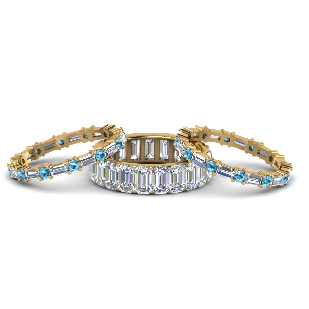 emerald-cut-eternity-band-with-matching-baguette-and-round-with-ice-blue-topaz-in-18K-yellow-gold-FD8331BGICBLTOANGLE1-NL-YG_96e560c8-4864-4fac-b0bb-fa30c13a4b81