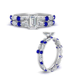 Load image into Gallery viewer, emerald-cut-sapphire-floating-marquise-accent-ring-with-eternity-wedding-band-in-white-gold-FDEWB9398EMGSABLANGEL3-NL-WG_59408f4a-f86b-47db-937d-607063323bab.jpg?v=1758802076
