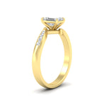 Load image into Gallery viewer, emerald-cut-swirl-channel-set-diamond-wedding-ring-in-yellow-gold-FDENS4028EMRANGLE2-NL-YG.jpg?v=1754995871