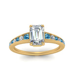 Load image into Gallery viewer, emerald-cut-swirl-engraved-channel-accent-diamond-engagement-ring-with-blue-topaz-in-FD122866EMRGICBLTO-NL-YG