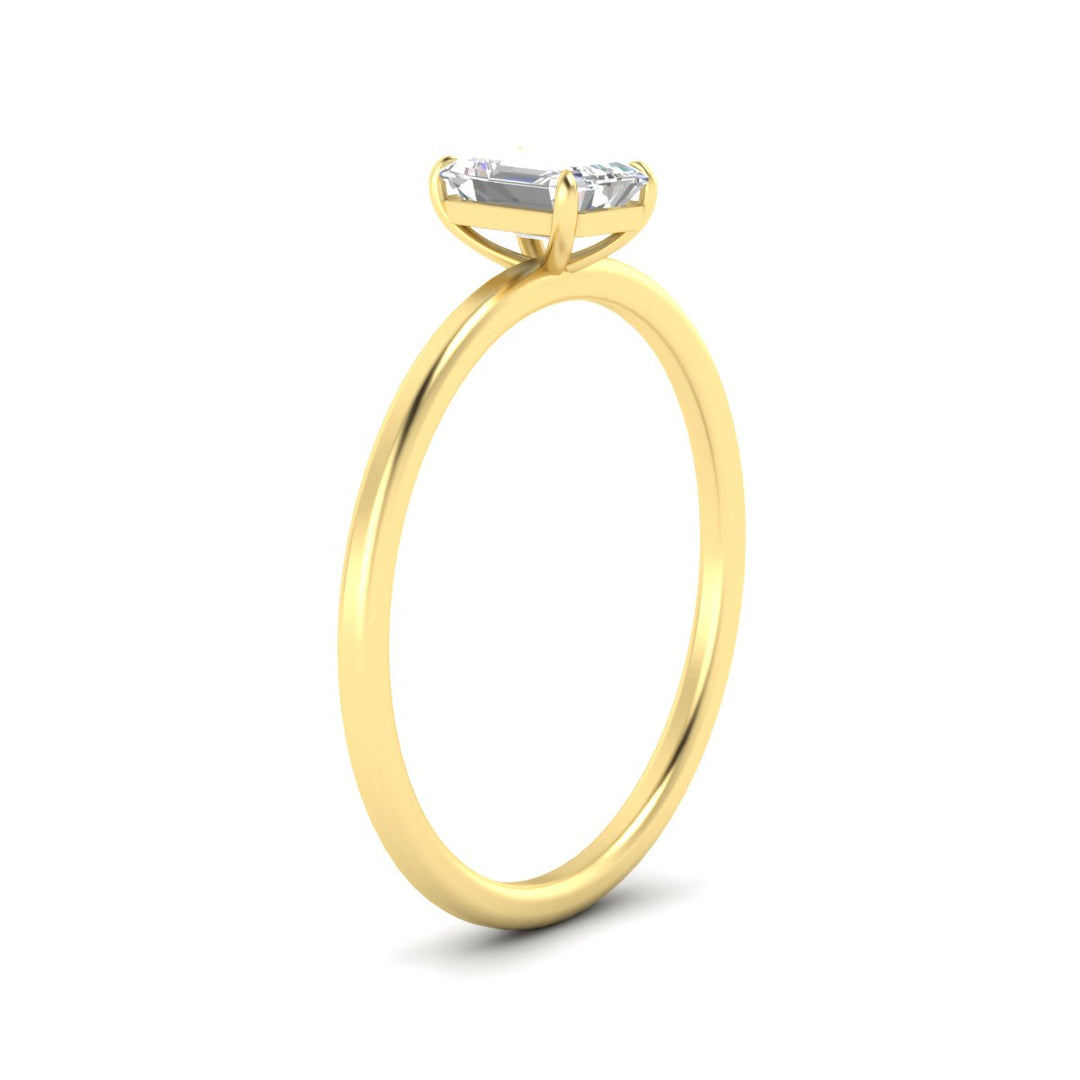 emerald-cut-thin-classic-solitaire-engagement-ring-in-yellow-gold-fdens9358emrangle2-nl-yg