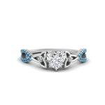 Load image into Gallery viewer, entwined-celtic-heart-shaped-love-knot-blue-topaz-engagement-ring-in-white-gold-FD9306HTRGICBLTO-NL-WG
