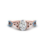 Load image into Gallery viewer, entwined-celtic-oval-shaped-love-knot-blue-topaz-engagement-ring-in-rose-gold-FD9306OVRGICBLTO-NL-RG
