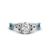 Load image into Gallery viewer, entwined-celtic-oval-shaped-love-knot-blue-topaz-engagement-ring-in-white-gold-FD9306OVRGICBLTO-NL-WG