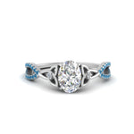 Load image into Gallery viewer, entwined-celtic-oval-shaped-love-knot-blue-topaz-engagement-ring-in-white-gold-FD9306OVRGICBLTO-NL-WG
