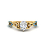 Load image into Gallery viewer, entwined-celtic-pear-shaped-love-knot-blue-topaz-engagement-ring-in-yellow-gold-FD9306PERGICBLTO-NL-YG
