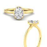 Load image into Gallery viewer, flush-collet-oval-shaped-solitaire-engagement-ring-in-yellow-gold-fdenr11593ovangle3-nl-yg?v=1756459480