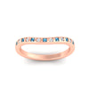 Load image into Gallery viewer, flush-set-blue-topaz-curved-wedding-band-in-rose-gold-fdens2255bgicbltoangle5-nl-rg-ws4.jpg?v=1776142549