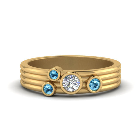 four-stone-diamond-asymmetrical-band-with-blue-topaz-in-yellow-gold-FD9098BGICBLTO-NL-YG