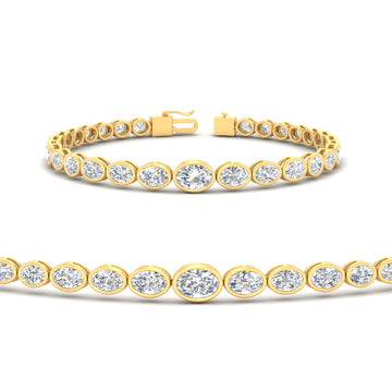 Graduated Bezel Oval East West Tennis Bracelet