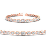 Load image into Gallery viewer, graduated-bezel-oval-east-west-tennis-bracelet-in-rose-gold-fdbrc11733angle2-nl-rg.jpg?v=1776313785