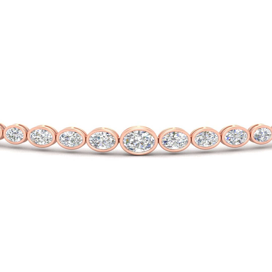 graduated-bezel-oval-east-west-tennis-bracelet-in-rose-gold-fdbrc11733angle5-nl-rg.jpg?v=1776313785