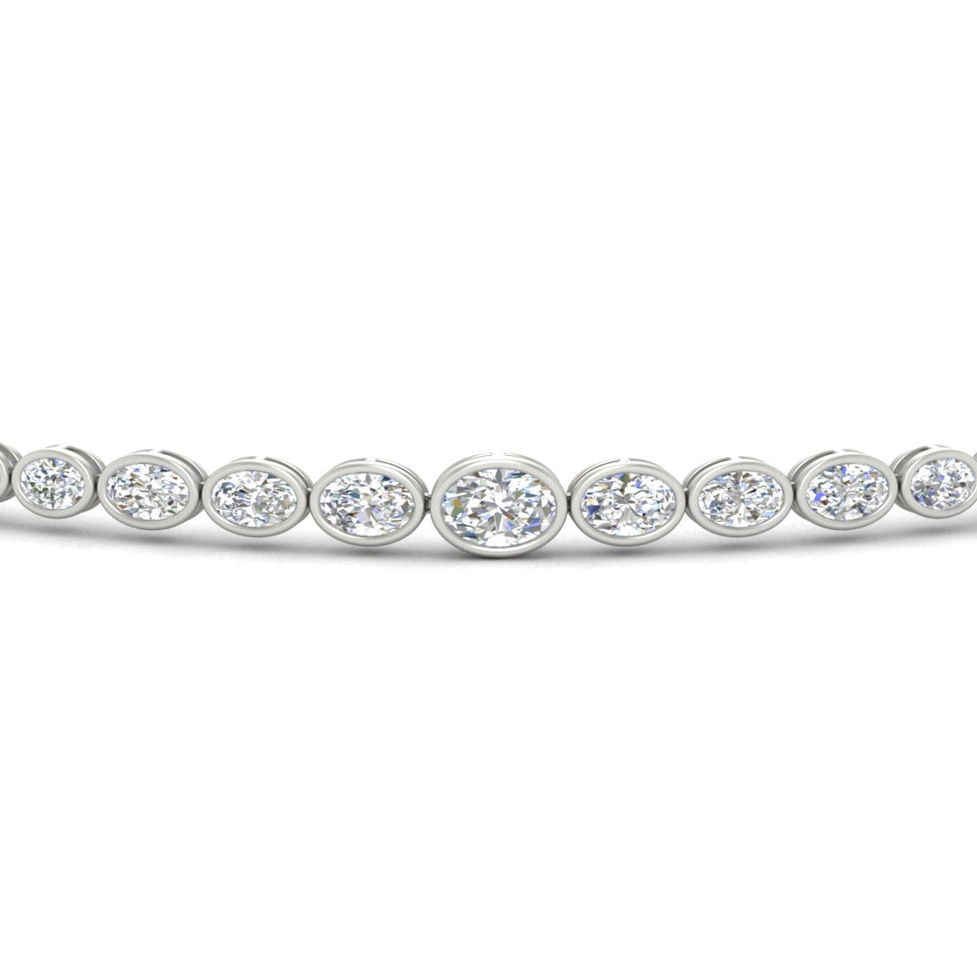 graduated-bezel-oval-east-west-tennis-bracelet-in-white-gold-fdbrc11733angle5-nl-wg.jpg?v=1776313785