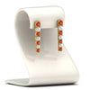 Load image into Gallery viewer, graduated-round-orange-sapphire-earring-in-yellow-gold-FDEAR10420GSAORSTAND-NL-YG