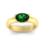 Load image into Gallery viewer, half-bezel-oval-shaped-emerald-east-west-ring-in-yellow-gold-fd11531ovrgemgr-nl-yg
