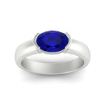 Load image into Gallery viewer, half-bezel-oval-shaped-sapphire-east-west-ring-in-white-gold-fd11531ovrgsabl-nl-wg

