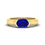 Load image into Gallery viewer, half-bezel-oval-shaped-sapphire-east-west-ring-in-yellow-gold-fd11531ovrgsabl-nl-yg
