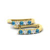 Load image into Gallery viewer, half-carat-small-hoop-blue-topaz-earrings-in-yellow-gold-FD-EAR9779GICBLTOANGLE3-NL-YG