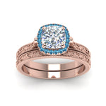 Load image into Gallery viewer, hand-engraved-cushion-cut-halo-diamond-wedding-ring-set-with-blue-topaz-in-rose-gold-FD8588CUGICBLTOANGLE5-NL-RG_5af800aa-32f3-4e59-a70d-4f3b4157004b?v=1757665318
