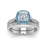 Load image into Gallery viewer, hand-engraved-cushion-cut-halo-diamond-wedding-ring-set-with-blue-topaz-in-white-gold-FD8588CUGICBLTOANGLE5-NL-WG_e8deaaca-321e-472d-8b33-de4c8016dbdd?v=1757665318
