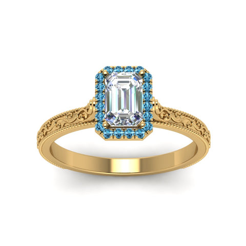 hand-engraved-emerald-cut-halo-diamond-engagement-ring-with-blue-topaz-in-yellow-gold-FD8588EMRGICBLTOANGLE5-NL-YG?v=1757588330