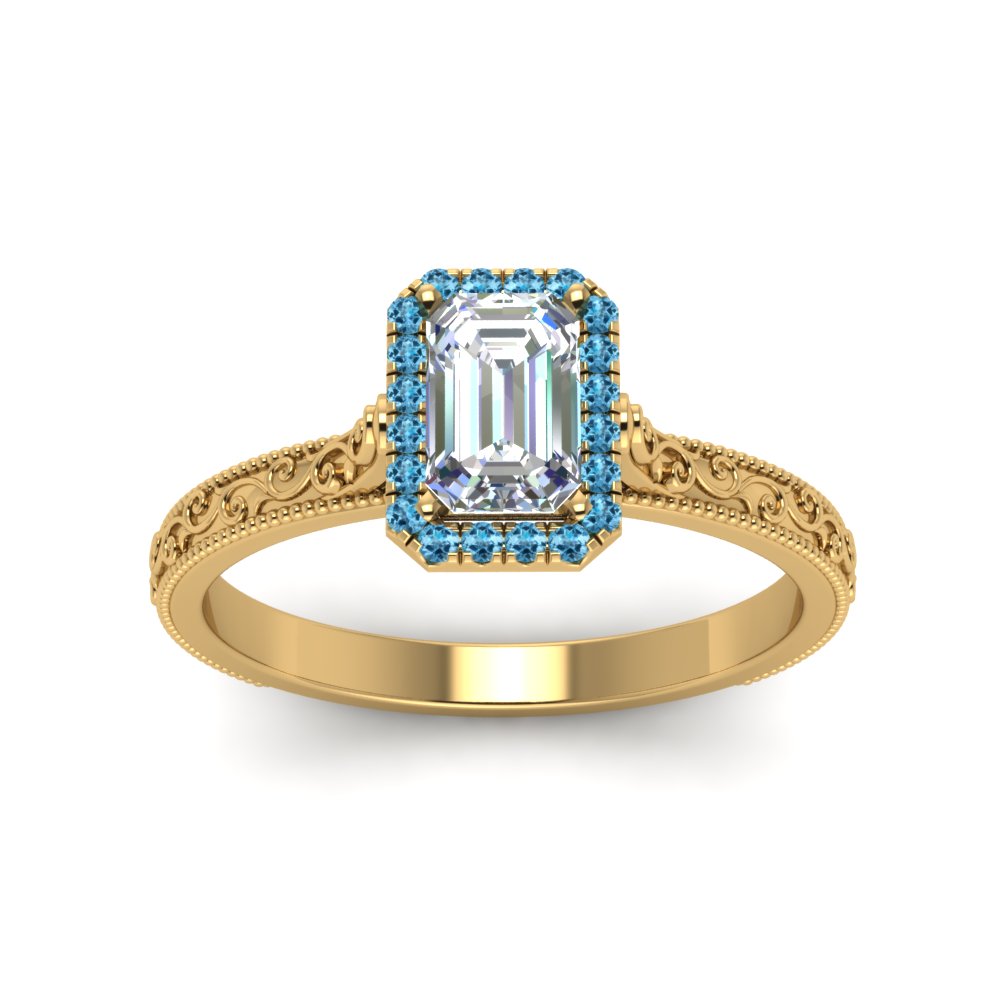 hand-engraved-emerald-cut-halo-diamond-engagement-ring-with-blue-topaz-in-yellow-gold-FD8588EMRGICBLTOANGLE5-NL-YG_61a32774-c641-49b5-966d-5f7d3095f09b?v=1757588497